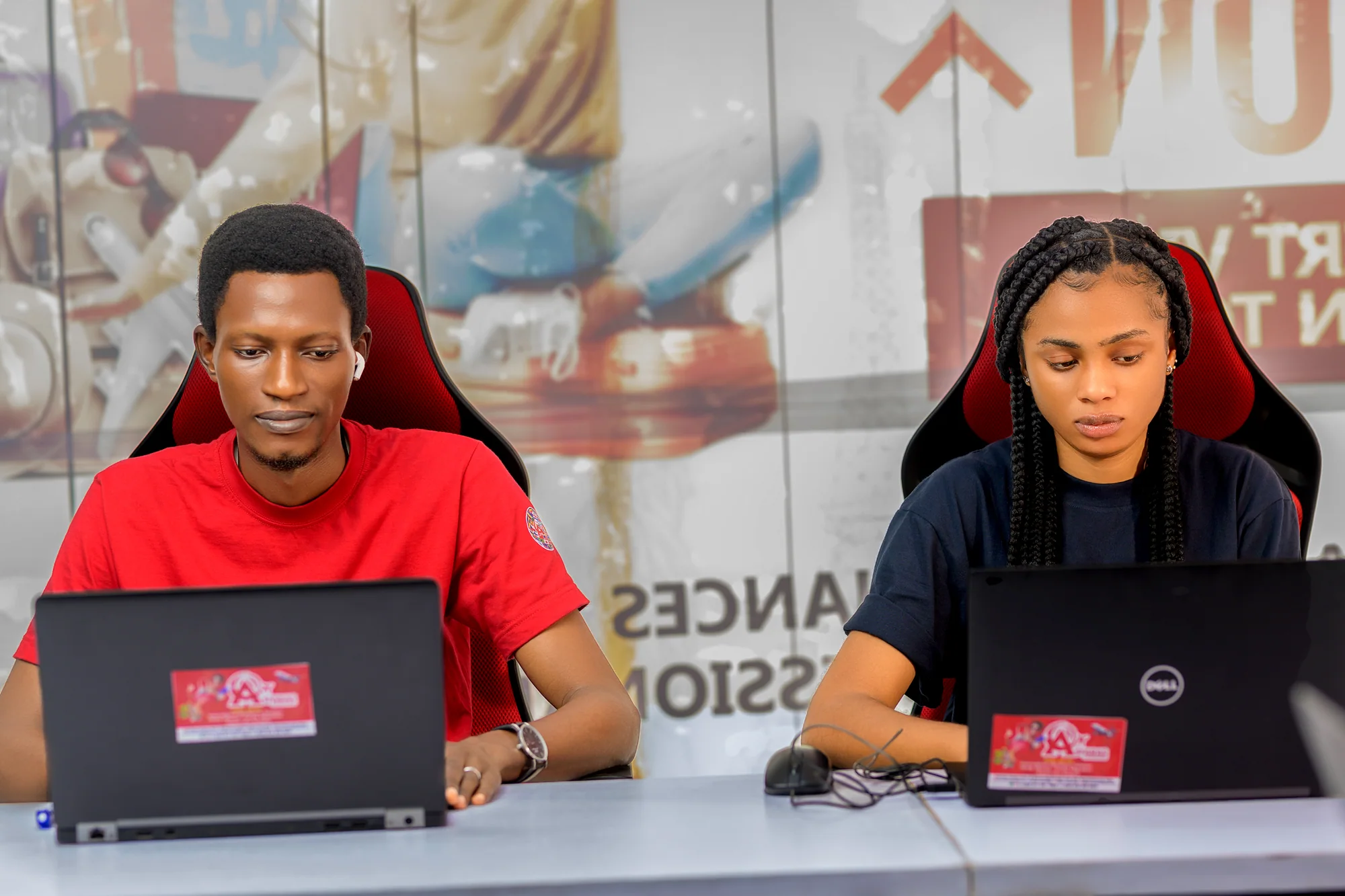 Two Asfaras team members working in the office